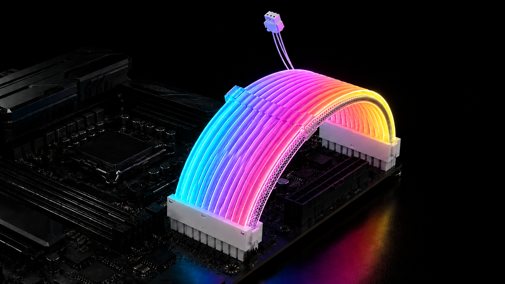 RGB motherboard power cable extension installed on a custom PC motherboard