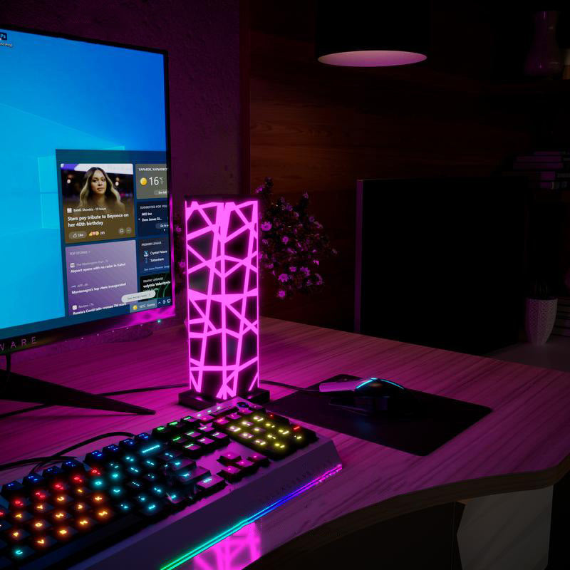 Aurora RGB lamp in a pink gaming setup providing cool led lights for gaming room ambience with smooth smart rgb lights.