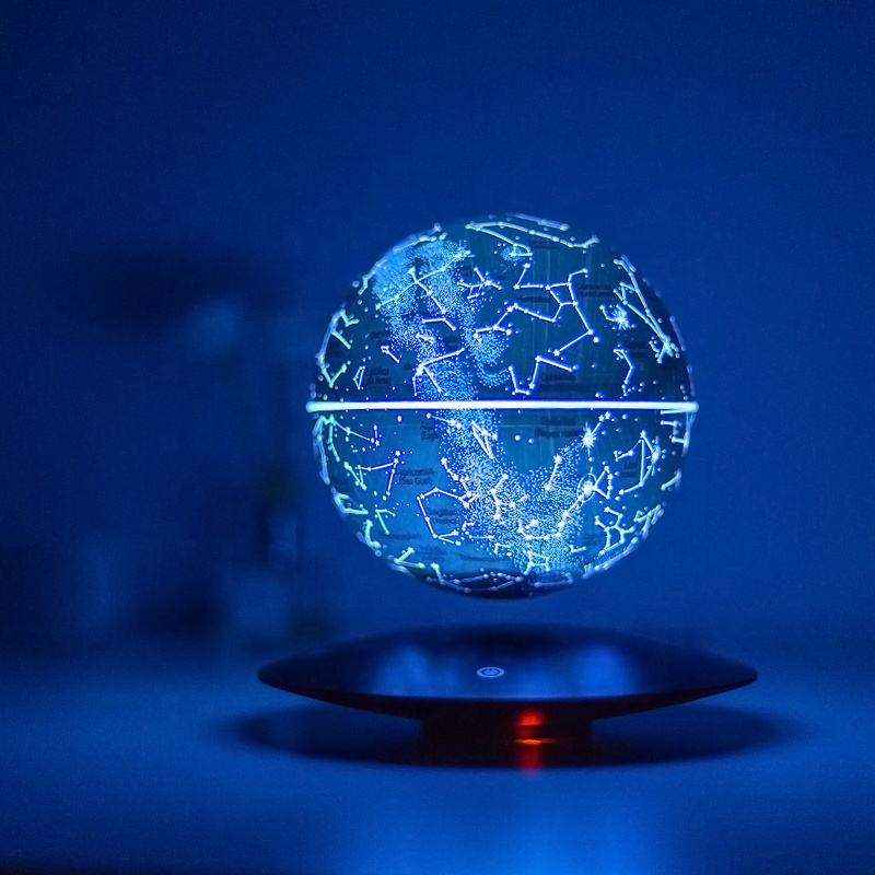Digital room design inspiration showing a levitating moon lamp with blue LED glow and magnetic clock base.