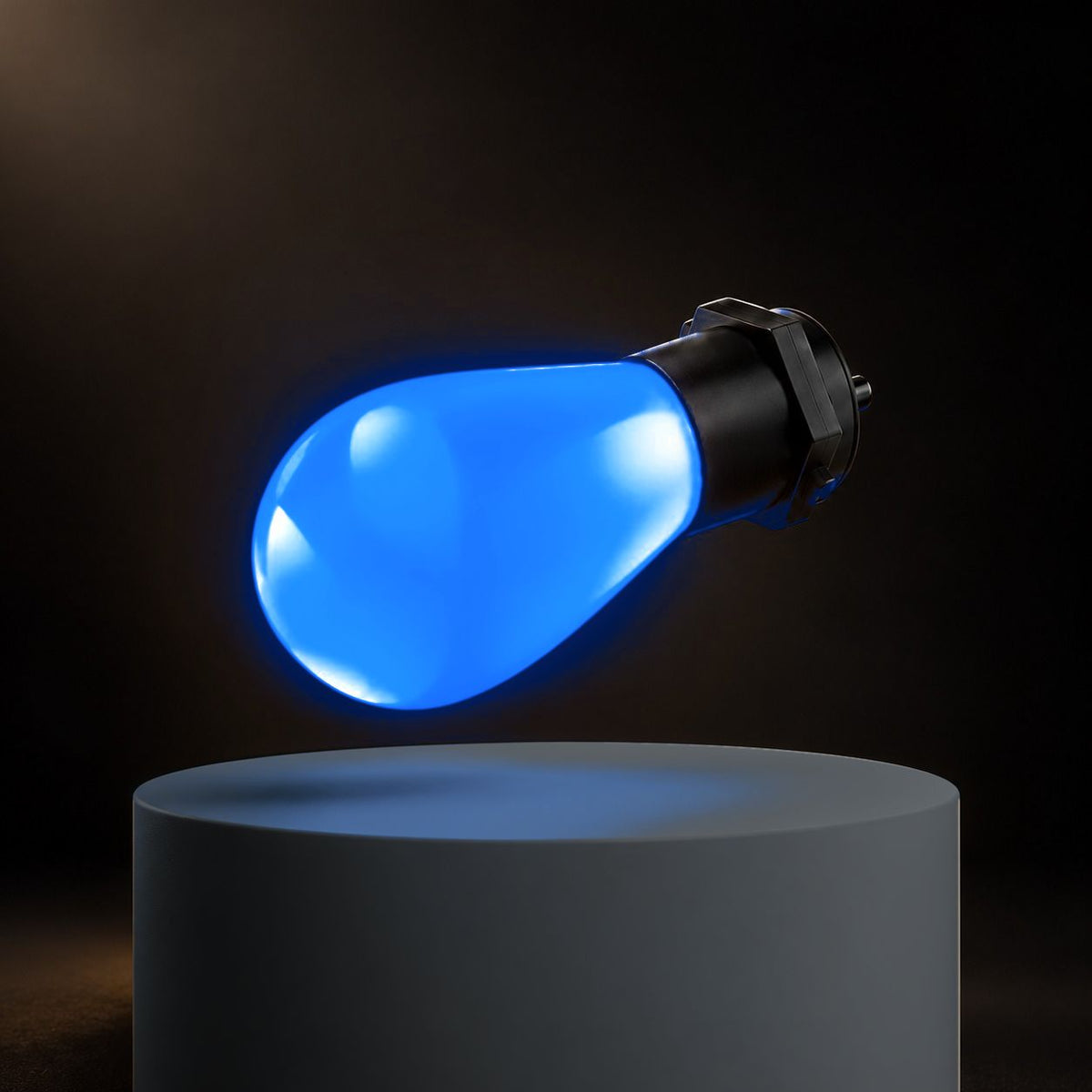 Close up of a blue RGB festoon light globe with black weather resistant housing