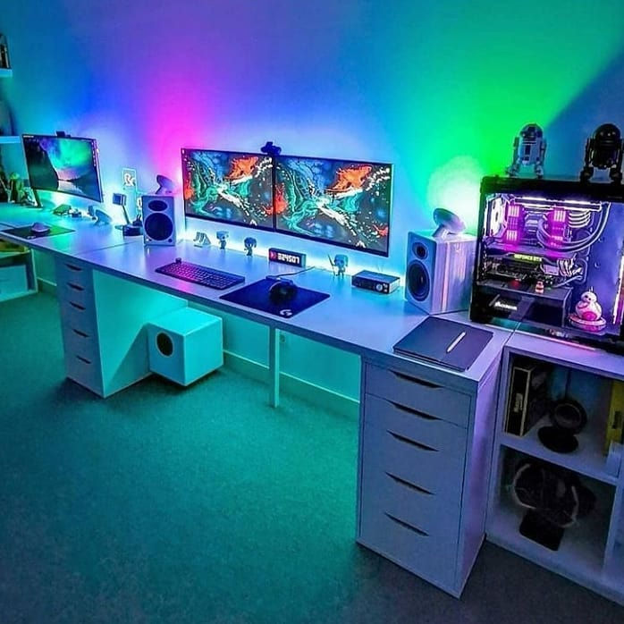User generated gaming setup featuring Atmos monitor sync lighting behind the desk.