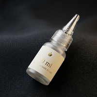 Vape fluid bottle with '20 ml' label on a dark textured background