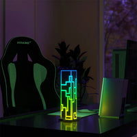 RGB Aurora lamp on a gaming desk creating smart rgb lights and cool led lights for gaming room setups.