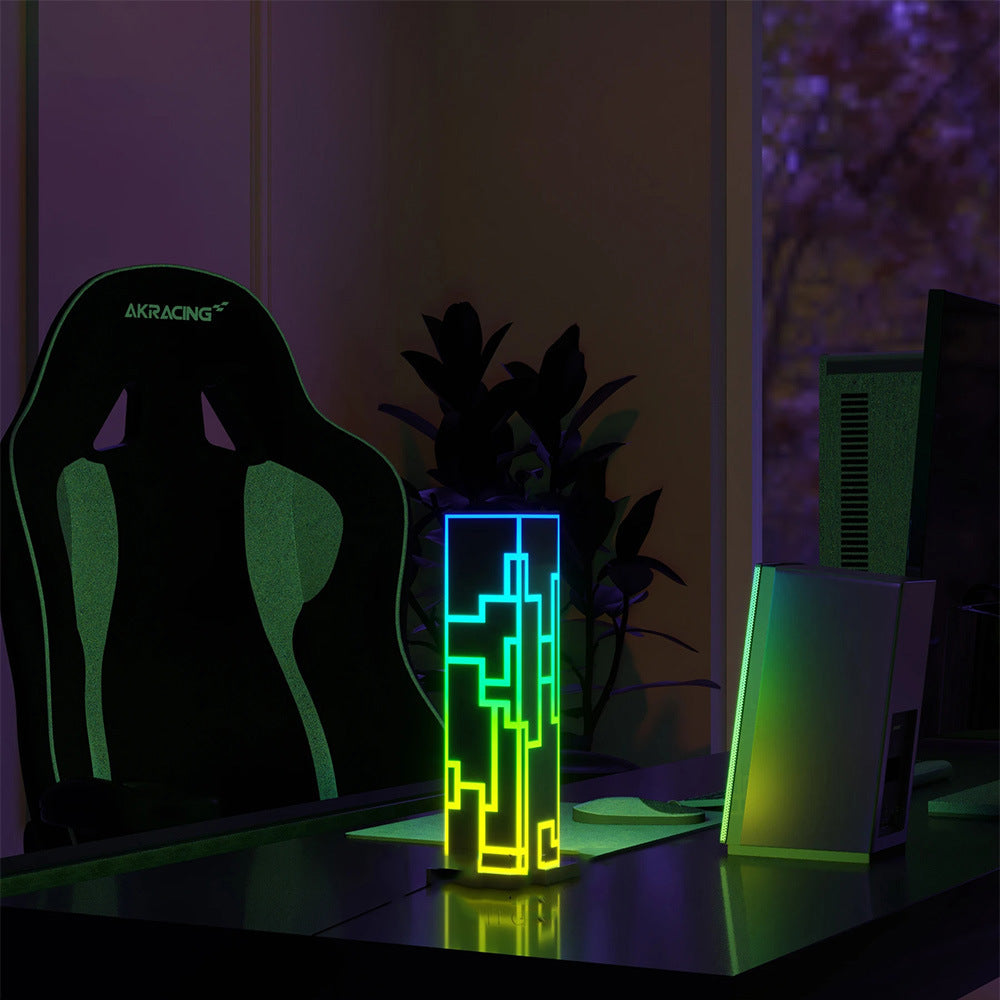 RGB Aurora lamp on a gaming desk creating smart rgb lights and cool led lights for gaming room setups.