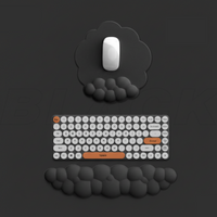 Black foam wrist rest and mouse combination shown on dark desk, suitable for desk kawaii and ergonomic wrist rest for keyboard enthusiasts.