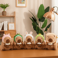 A lineup of Capybara plush characters from Zyko’s collection of high quality stuffed animals, styled in a cozy home setting with soft plush material details.