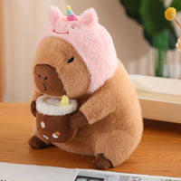 Adorable Capybara Unicorn plush holding a cup, a perfect choice for cute valentine’s gifts or thoughtful décor for cozy room ideas.
