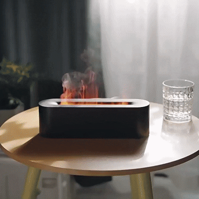 Flame diffuser creating a calm meditation area with gentle light and mist.