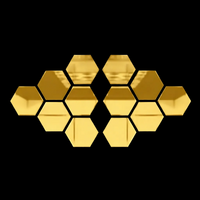 modern gold wall mirror arrangement presented on black wall showing reflective acrylic finish for stylish decor