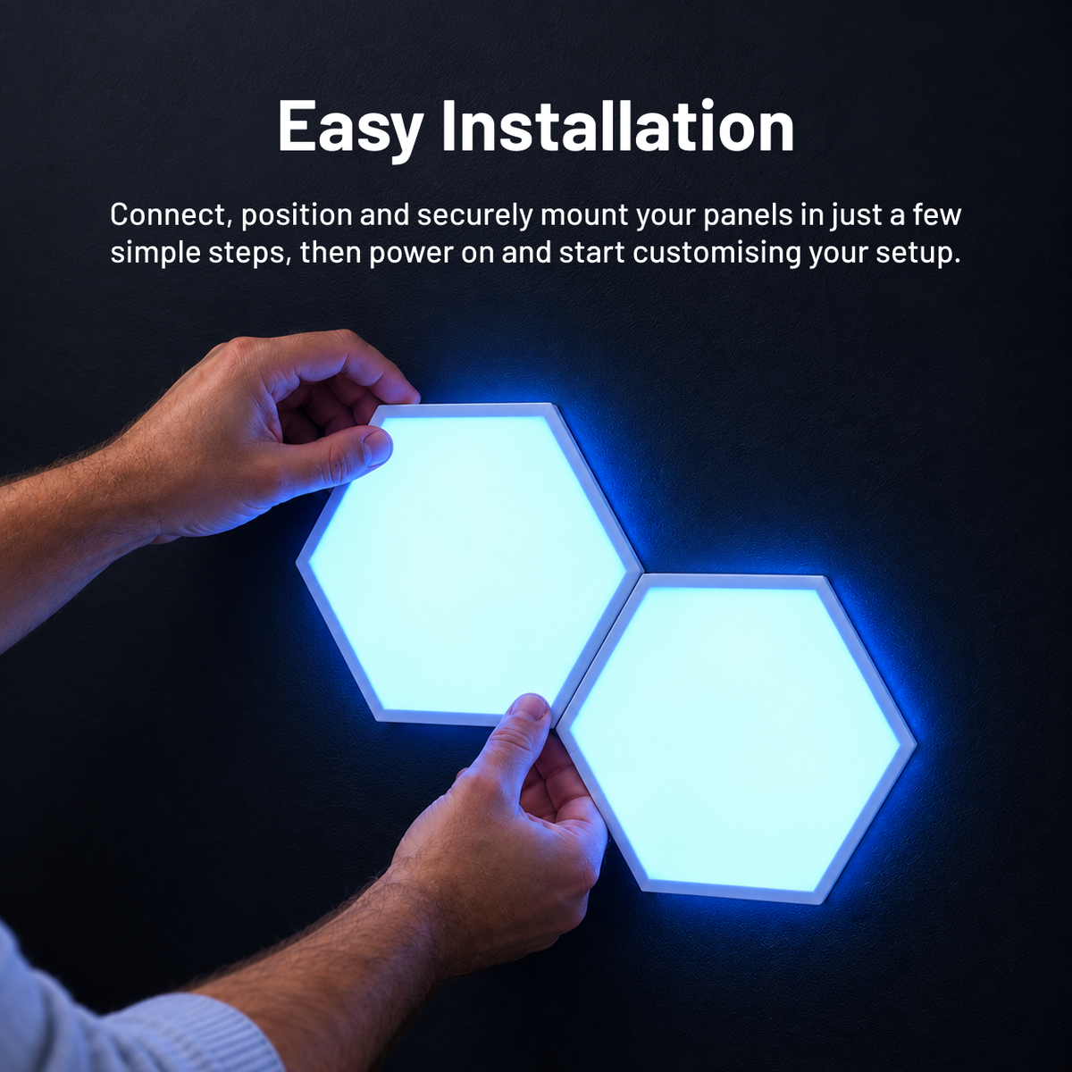 Installing Zyko hexagon light panels together on a wall using their modular connections