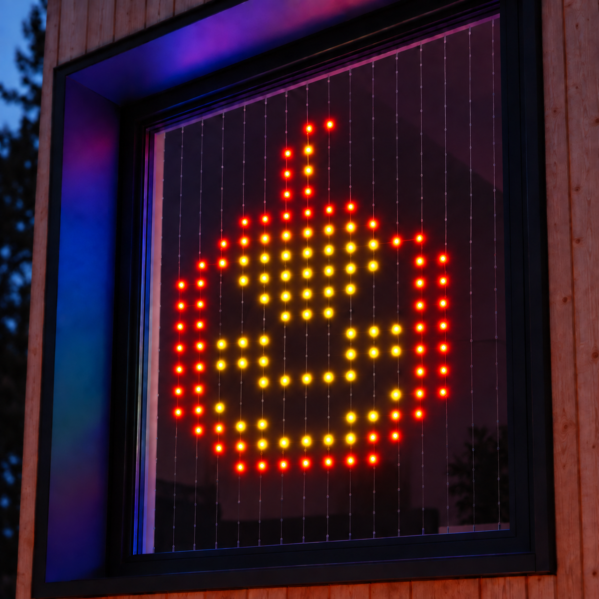 LED curtain lights displaying a glowing pumpkin design