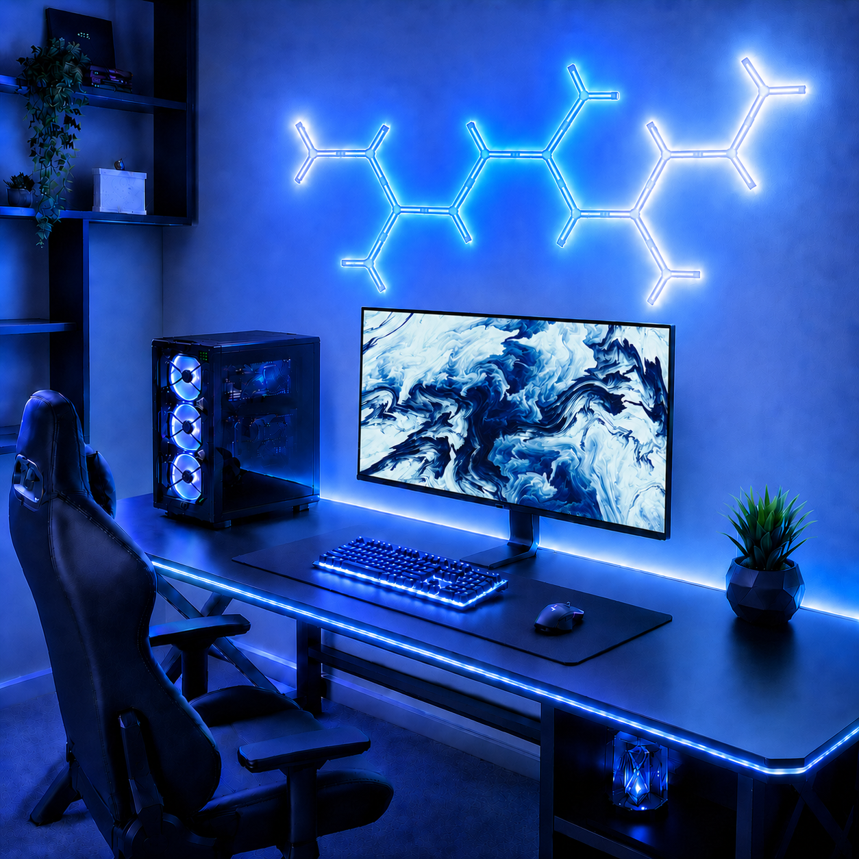 Modular Y wall lights creating blue ambient lighting above a gaming desk