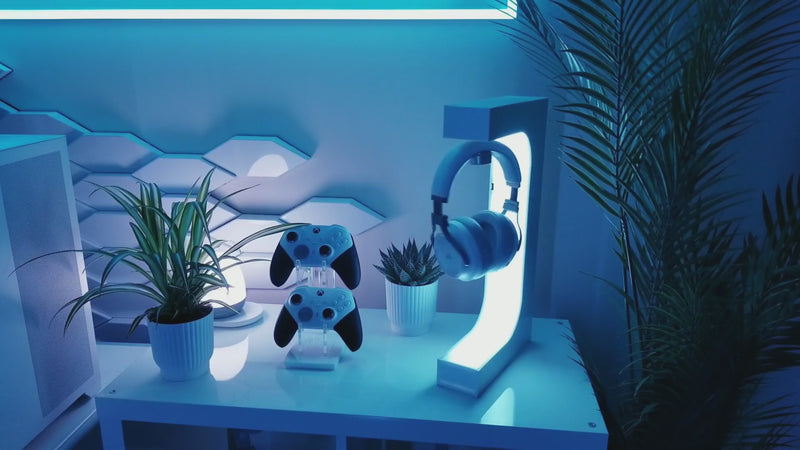 Video demonstrating a floating headset stand with magnetic levitation technology, showcasing gaming headphones as a premium desk display feature.