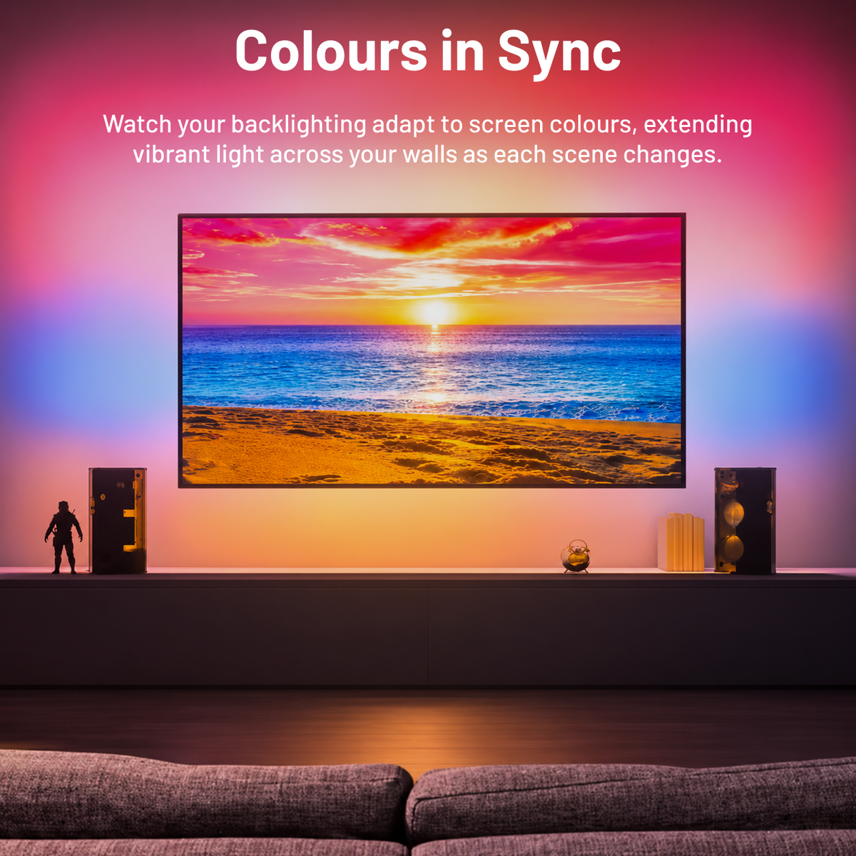 TV showing an ocean sunset with pink, orange and blue backlighting demonstrating screen colour synchronisation.