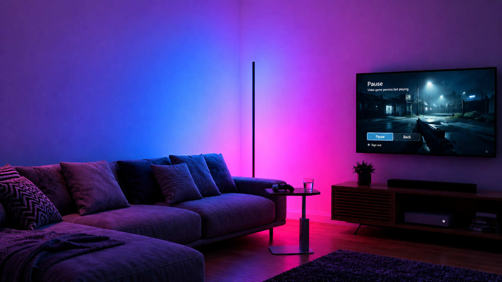 Modern living room after adding RGB floor lamp with blue and pink wall wash lighting for a gaming setup