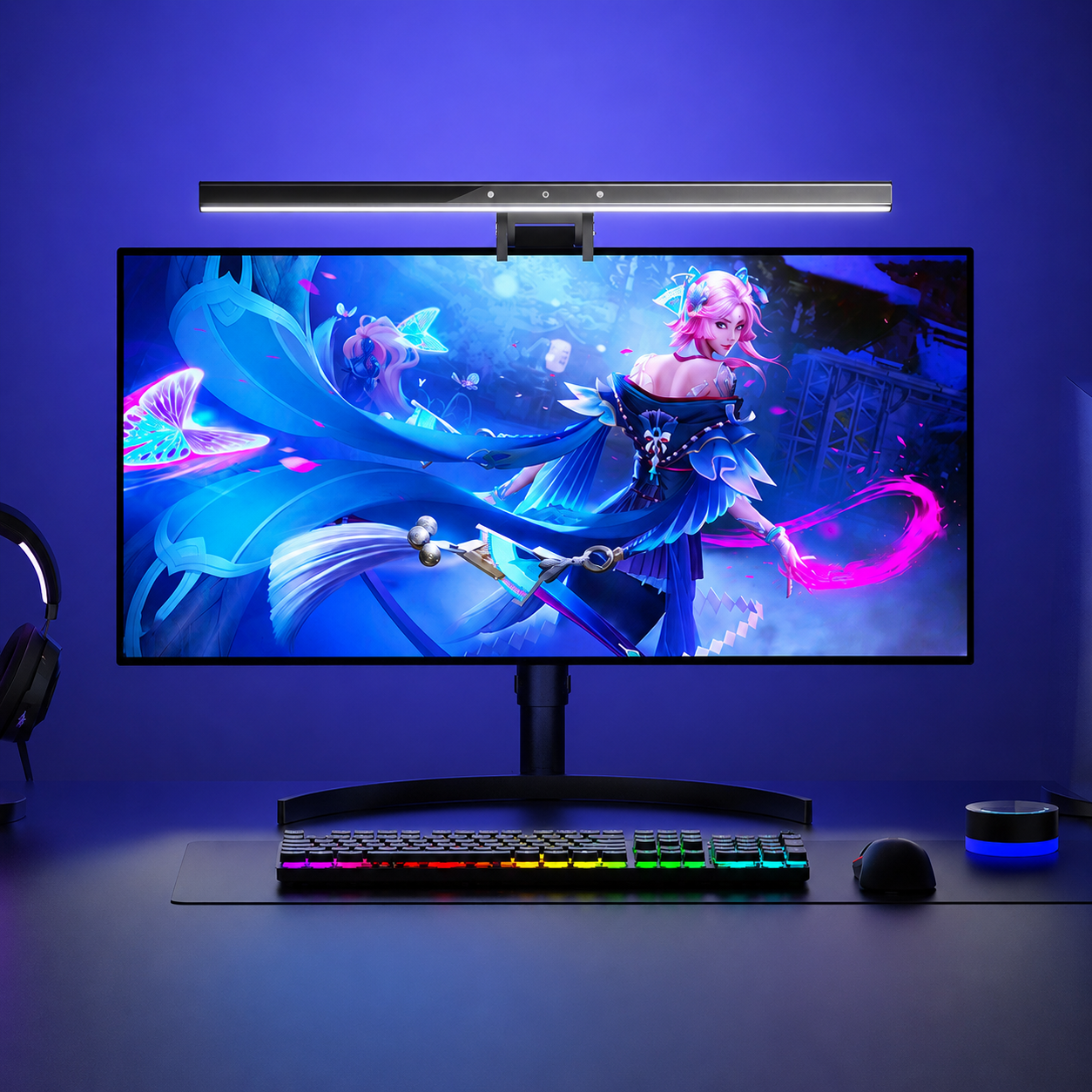 RGB monitor light bar installed above a gaming monitor in a blue-lit desk setup