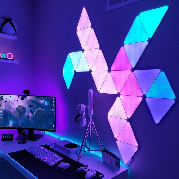 User generated gaming room with Elements Triangle Panels creating colourful wall lighting.