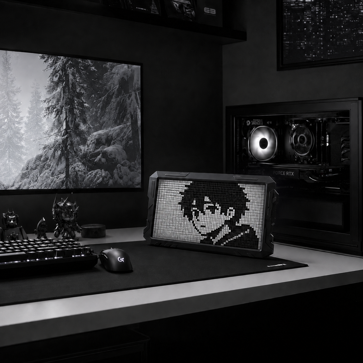 Wide pixel art display positioned beneath a monitor in a gaming setup