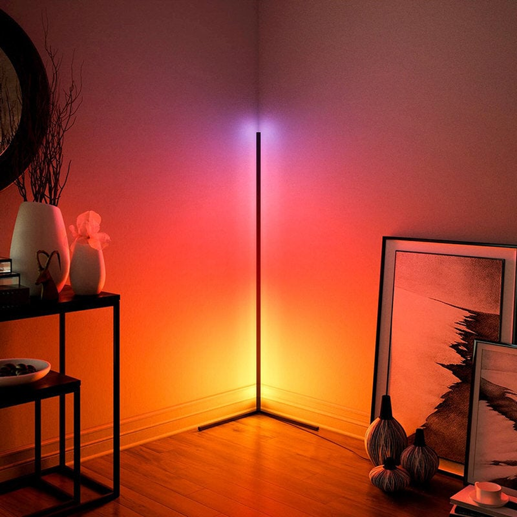 WiFi enabled LED bulbs style ambient corner floor lamp changing colours from purple to orange.