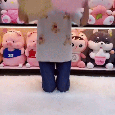 Slow-motion GIF showing Zyko Boba Tea Plush toys in a warm, cozy bedroom setting, comforting like a giant teddy bear for adults and inspiring warm and cozy bedroom ideas
